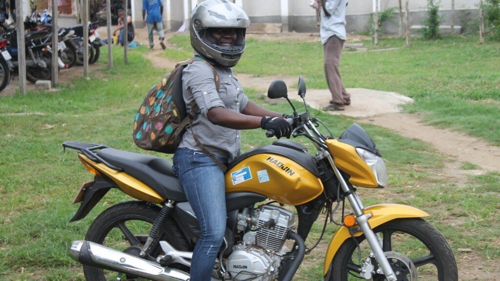 A motorcyclist on a road in Togo