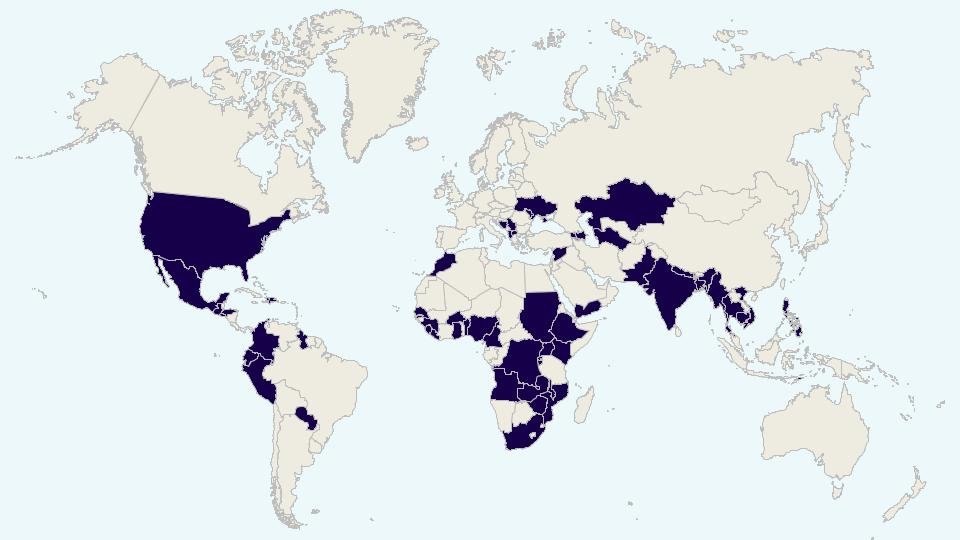 World map showing countries in dark blue where Local Works Global network members are from, with other countries in light beige